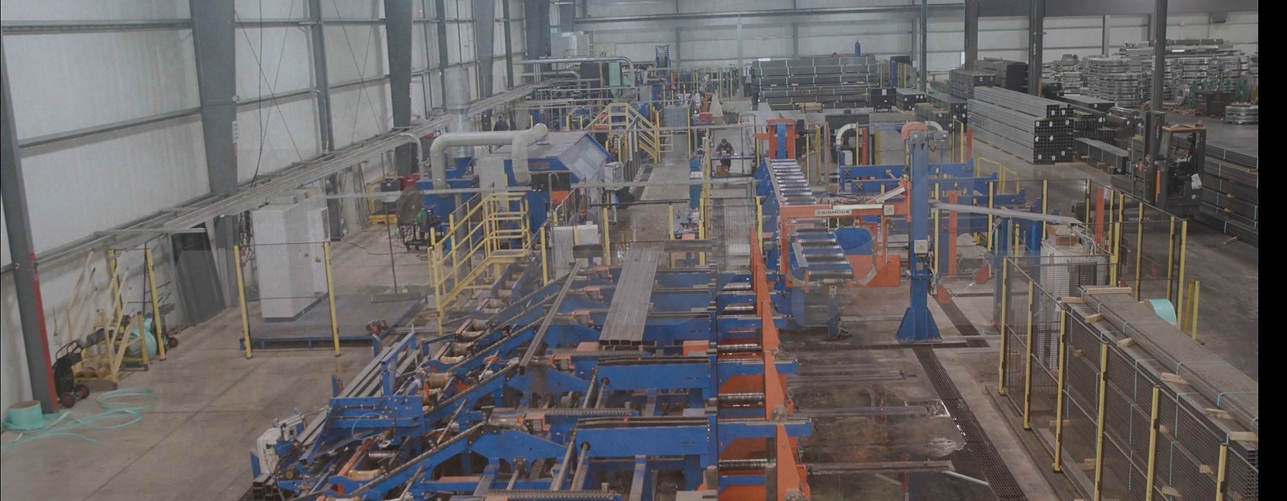 Wide view of the Major Metals production floor in Mansfield, Ohio — tube mill lines, finished product, and shop floor activity