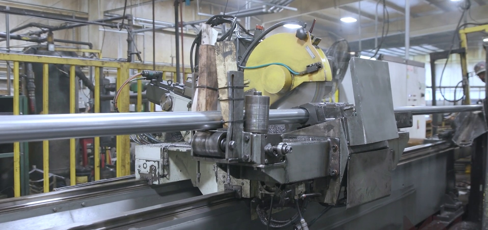 Steel tube on the cut-to-length line — square tube being processed and finished on the Mansfield, Ohio production floor